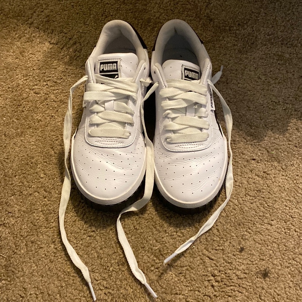 White and Black Puma Sneakers
